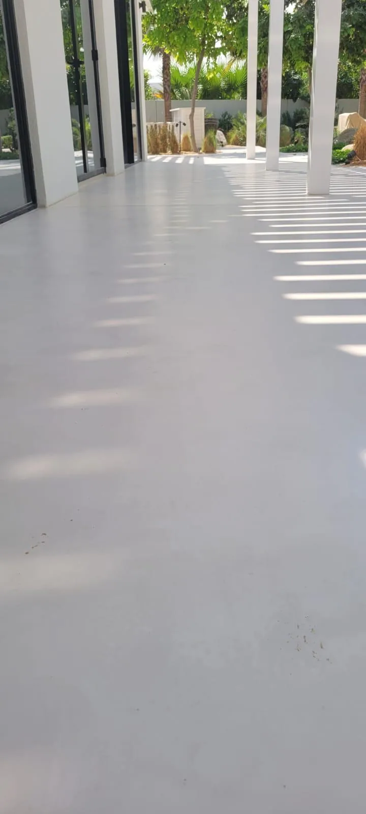 Covered private terrace with a smooth weather-resistant floor