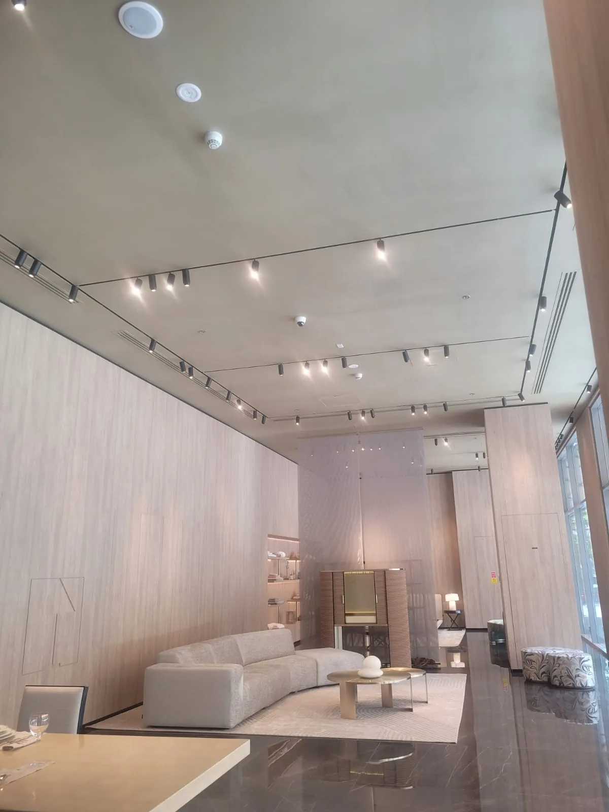 Luxury commercial showroom lounge with a seamless decorative ceiling