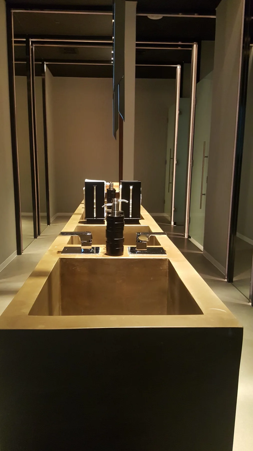 Dark luxury bathroom with a hand-finished zinc vanity