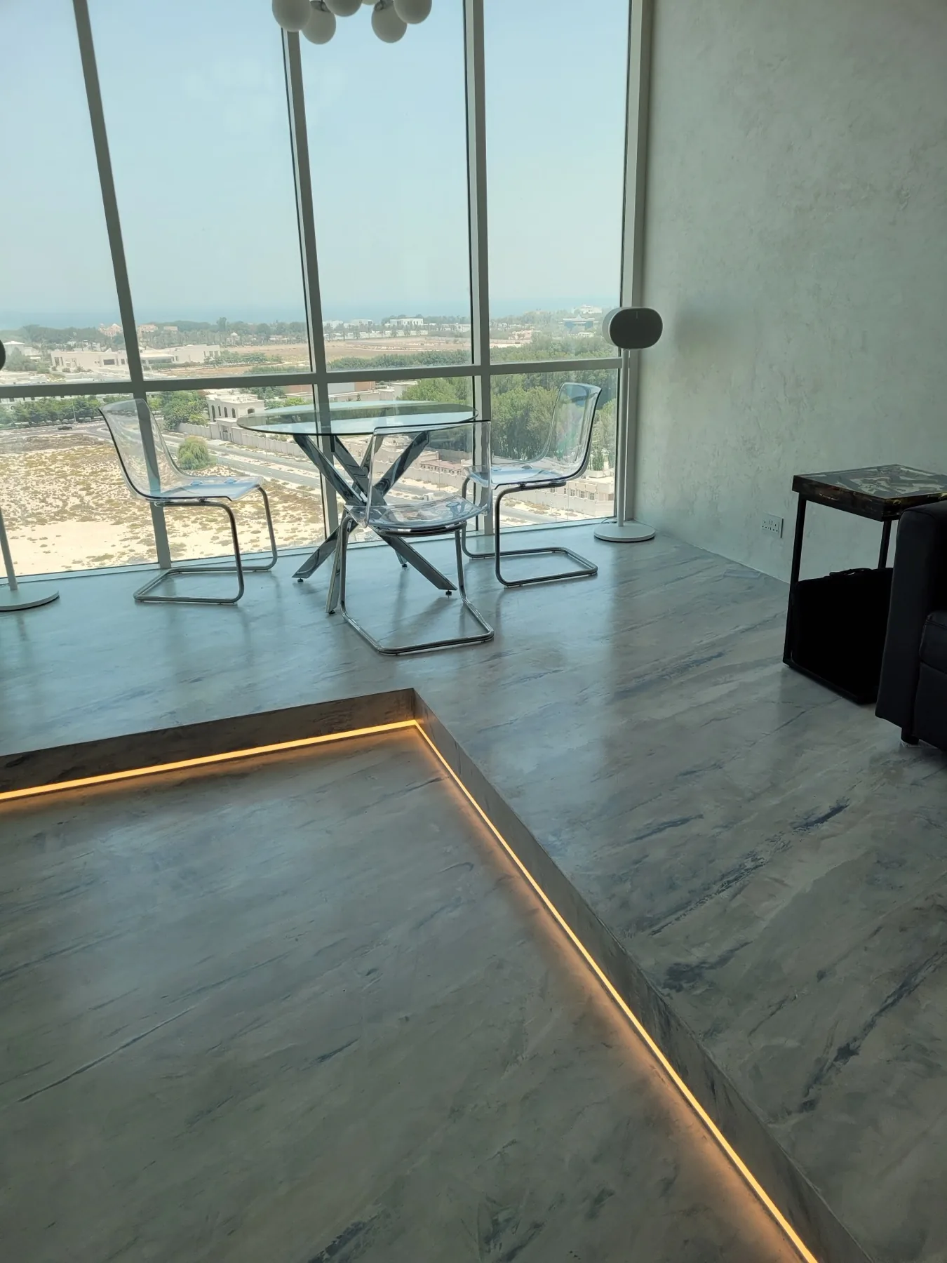 Private apartment overlooking Dubai with seamless mineral floor